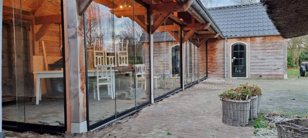 Aluminium veranda - Glazen schuifwand - Bouwbedrijf Steevens - Header glazen schuifwand